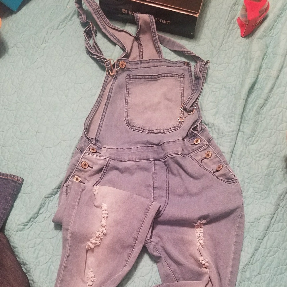Distressed style over all denim suit